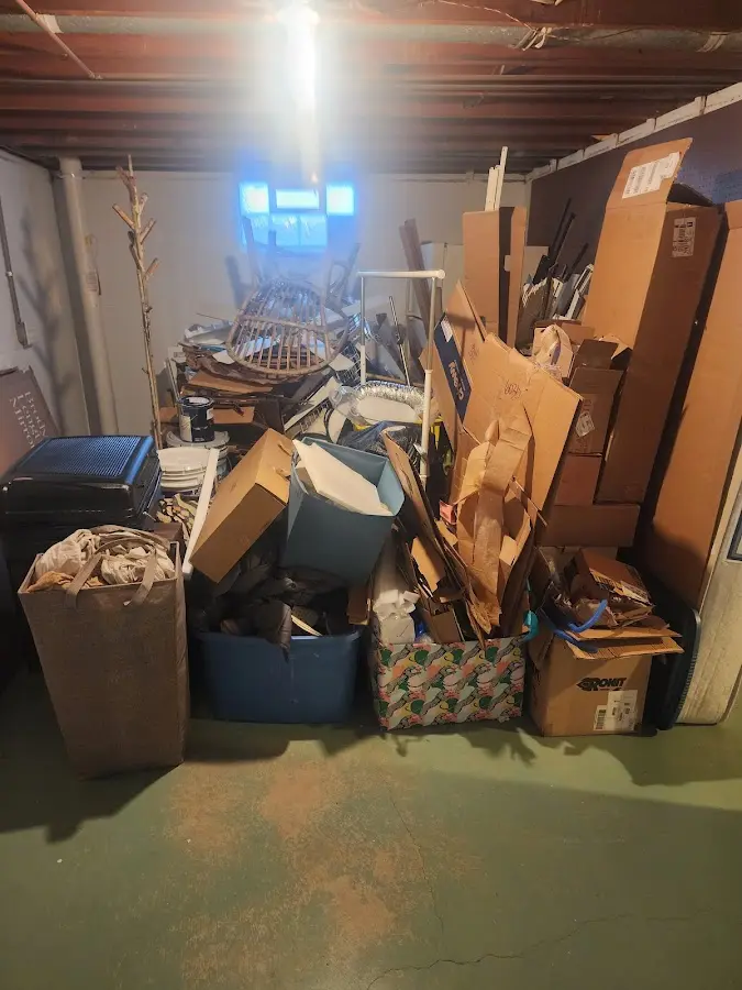 Roll-off dumpster container at job site for 6 Yard Dumpster Rental in New Boston